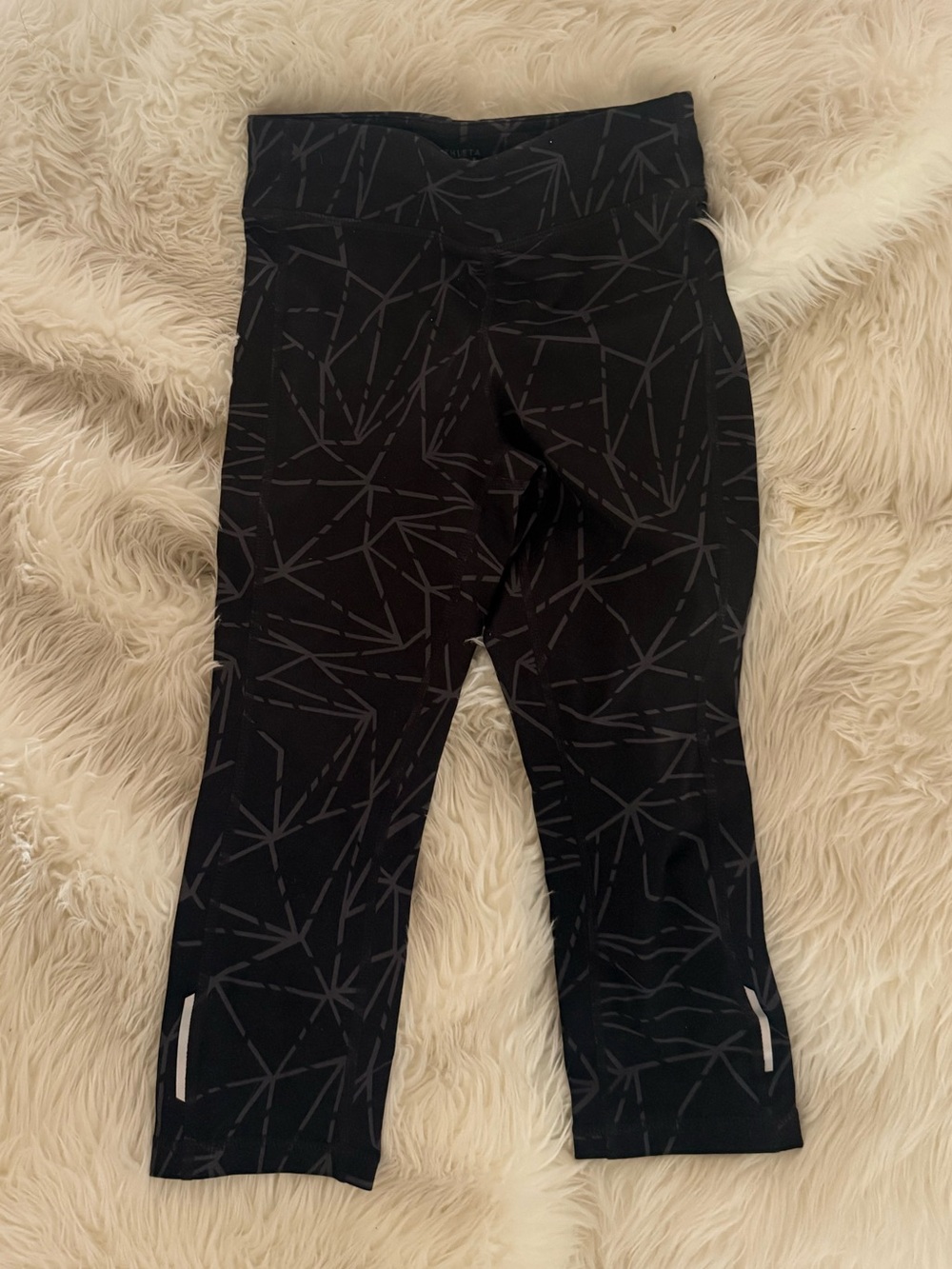 Athleta Black Capri Leggings with Reflective Accents